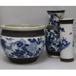 A Chinese blue and white crackleglaze jardiniere and two vases