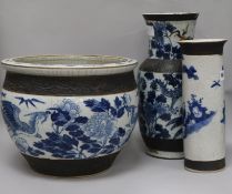 A Chinese blue and white crackleglaze jardiniere and two vases