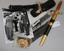 A 20th century Russian Army dagger, Naval belt, badges and insignia including photos etc