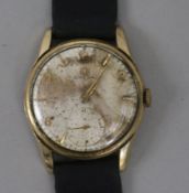 A gentleman's 1960's 9ct gold Omega manual wind wrist watch, with subsidiary seconds and case back