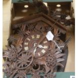 A Black Forest walnut cuckoo clock