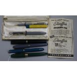 A 'Sheaffer's Snorkel' White Dot pen and pencil set, cased, three other Sheaffer and an Onoto pen