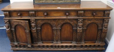 A carved oak dresser base, W.179cm