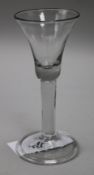 A wine glass, c.1740, with a bell bowl, on plain stem, on a folded foot, 6in.