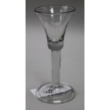 A wine glass, c.1740, with a bell bowl, on plain stem, on a folded foot, 6in.