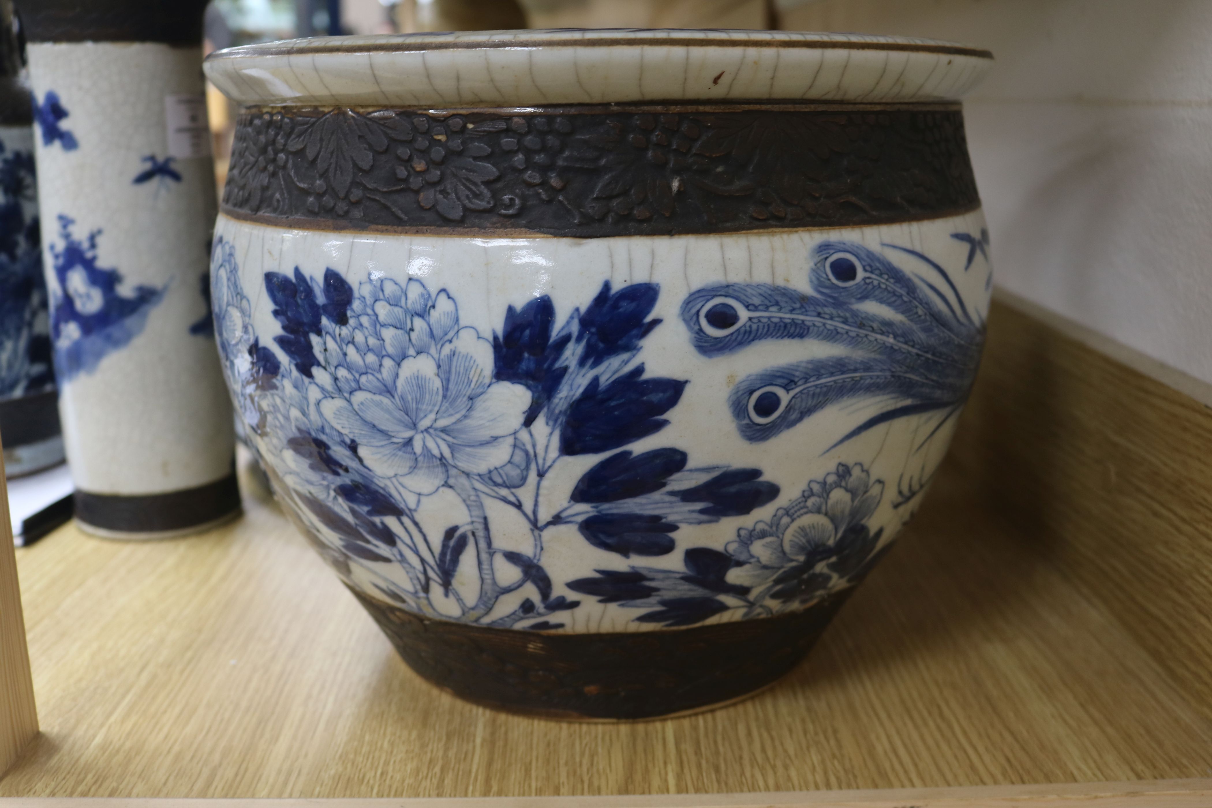 A Chinese blue and white crackleglaze jardiniere and two vases - Image 11 of 13