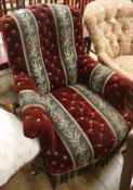 A late Victorian button back ebonised easy armchair