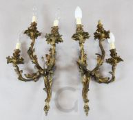 A pair of 19th century Louis XV style three branch wall lights, H.24in.