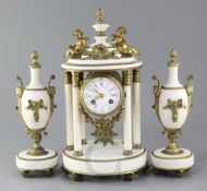 A Louis XV style ormolu mounted marble portico clock, c.1900 with matching urns, 14.5in. urns 11.