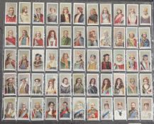 A folio album of cigarette cards on the theme of Kings, Queens and Beauties, mainly full sets,