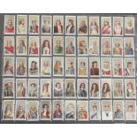 A folio album of cigarette cards on the theme of Kings, Queens and Beauties, mainly full sets,