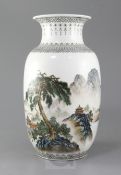 A Chinese enamelled porcelain 'landscape' vase, decorated with pavilions in a mountainous river