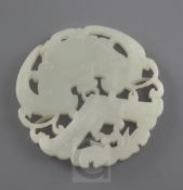A Chinese white jade plaque, late 19th / early 20th century, carved and pierced with a bat