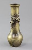 A Chinese bronze bottle vase, Xuande mark, Ming dynasty 16th century, the neck cast in high relief