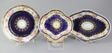 An English porcelain fourteen piece dessert service, early 19th century, each piece with a central