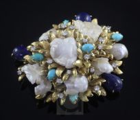 A large gold, baroque pearl, lapis lazuli, turquoise and diamond set clip brooch, of shaped oval