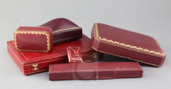 Six assorted jewellery boxes including two large Cartier boxes and two small Cartier boxes.