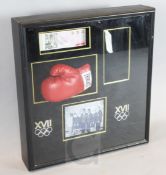 Muhammed Ali. A signed Everlast boxing glove, in presentation display case, provenance; Online