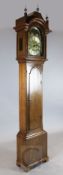 George Hewett of Marlborough. A George III oak eight day longcase clock, the 12 inch arched brass
