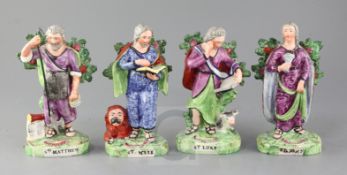 A set of four Staffordshire Pearlware figures of Saints, by Salt, comprising Saint Matthew, Saint