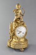 A late 19th century French ormolu mantel clock, by Lachenal of Paris, surmounted with a figure of