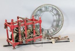 An early 19th century iron framed turret clock movement, with silvered Roman dial inscribed Made