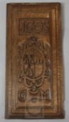 An armorial panel dated 1605, monogrammed G.M. 23.5 x 10.5in.16th-19th WOOD CARVINGS FROM THE ESTATE