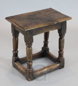 A 17th century oak joint stool, W.1ft 7in. D.1ft H.1ft 7in.