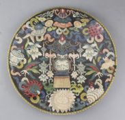 Three Chinese kesi woven roundels, 19th century, each polychrome decorated with Buddhist emblems,