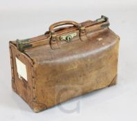 A Victorian pigskin Louis Vuitton Gladstone bag, bearing labels for Captain Robertson RN, 20 x 13.