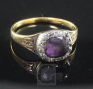 A Georgian gold, amethyst and rose cut diamond set cluster mourning ring, (engraved inscription