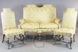 A Louis XIV design silvered wood seven piece salon suite, comprising two seater settee and six