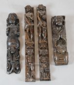 Four various 17th century carved oak figural corbels