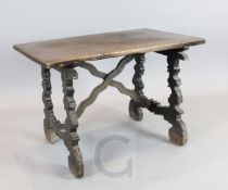 A late 17th century Spanish walnut table, with rectangular top and trestle end supports, W.3ft