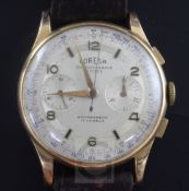 A gentleman's 18ct gold Coresa chronograph manual wind wrist watch, the silvered dial with baton and