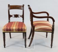 A set of eight Regency brass strung mahogany dining chairs including two carvers Height of carvers