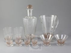 A Rene Lalique fifty piece Pouilly pattern brown stained and frosted suite of table glass, including