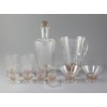A Rene Lalique fifty piece Pouilly pattern brown stained and frosted suite of table glass, including