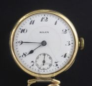 A 1920's 18ct gold Rolex nurses? fob watch, with Arabic dial and subsidiary seconds.