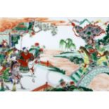 A set of three Chinese famille verte plaques, late 19th century, each painted with battle scenes