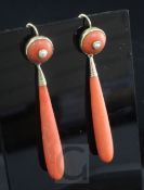 A pair of gold mounted, split pearl set coral drop earrings, overall 6cm.