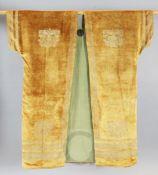 A rare Mariano Fortuny honey coloured silk velvet mantle, c.1900, decorated with a gilt hand blocked