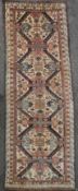 A Seichur ivory ground runner, c.1890, with field of geometric and foliate motifs, 10ft 9in by 3ft