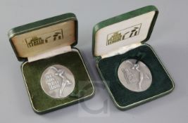 Two John Player League runner's up medals presented to D.B. Close CBE, dated 1974 and 1976, in