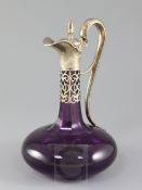 A Victorian silver mounted amethyst glass claret jug and stopper by Charles Reily & George Storer,