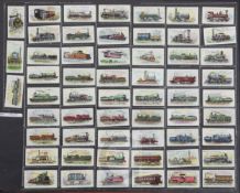 Two folio albums of cigarette cards on the theme of Railways, Motoring, etc. mainly full sets,