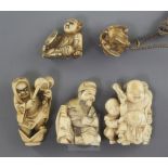 Four Japanese ivory netsuke and a similar ojime, Meiji period, two of the netsuke carved as