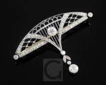 A Belle Epoque gold, platinum and diamond set openwork demi lune drop brooch, 46mm.