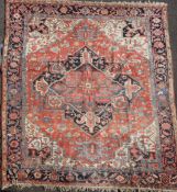 A Hamadam carpet, the pink field woven with lozenge medallion centre, 12ft 4in by 9ft 9in.