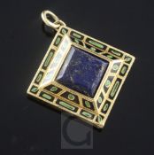 A gold, lapis lazuli and enamel set diamond shaped pendant locket, the central stone bordered by two